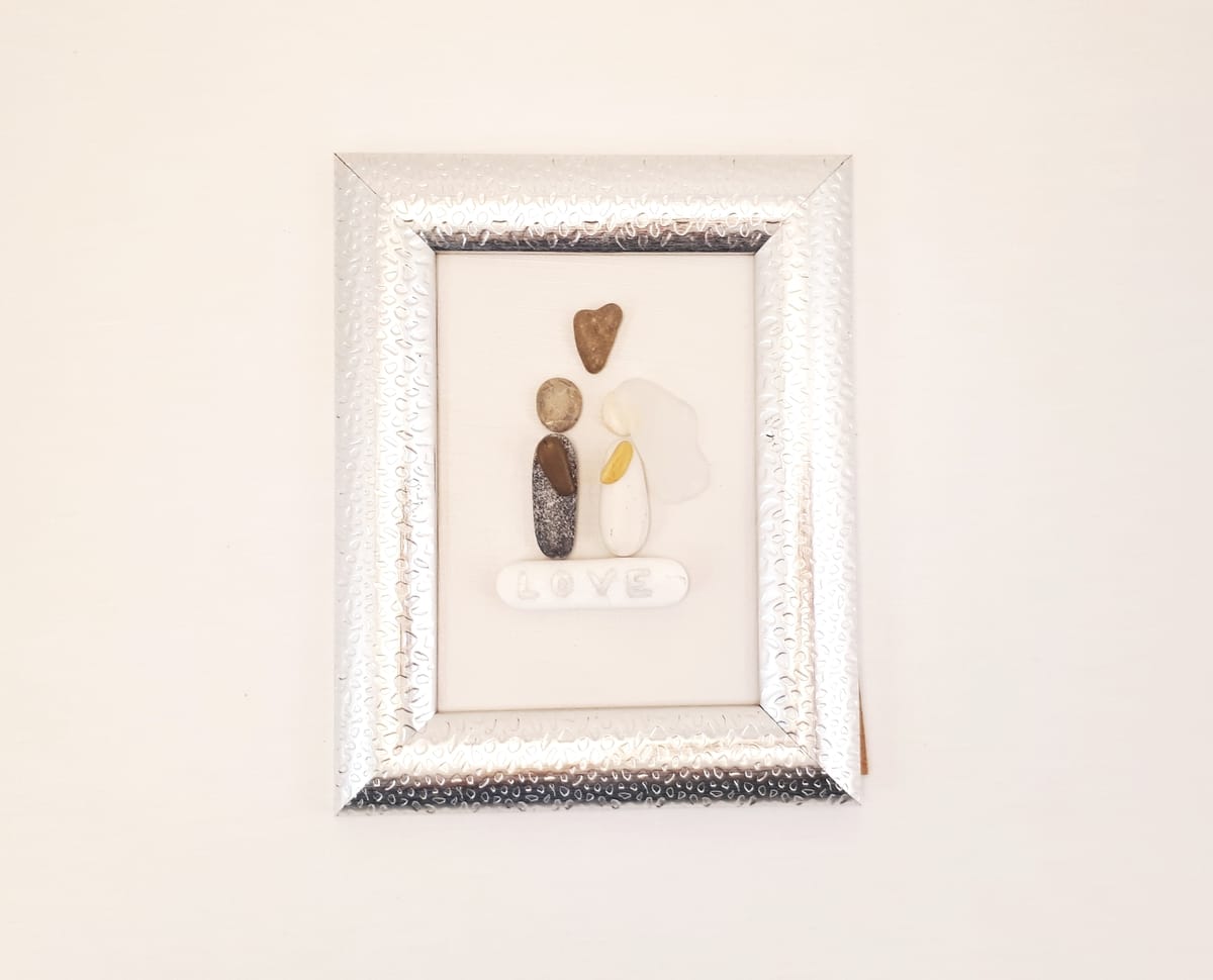 Beach Pebble Frame with "Wedding" theme in silver color frame.